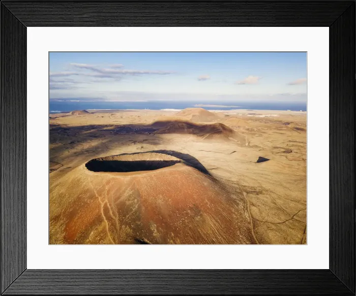 Framed Print : el Calderon Hondo, Volcano in Fuerteventura, ocean in background