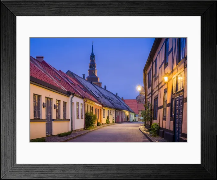 Framed Print : Sweden, Southern Sweden, Ystad, Old Town street with view of Sankta Maria kyrka church Framed Print : Sweden, Southern Sweden, Ystad, Old Town street with view of Sankta Maria kyrka church