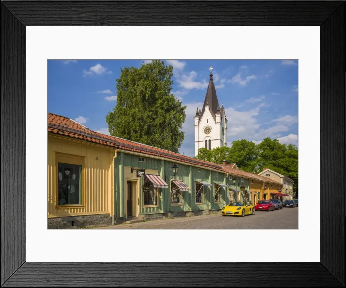 Framed Print : Sweden, Vastmanland, Nora, traditional wooden buildings along the main street with Framed Print : Sweden, Vastmanland, Nora, traditional wooden buildings along the main street with