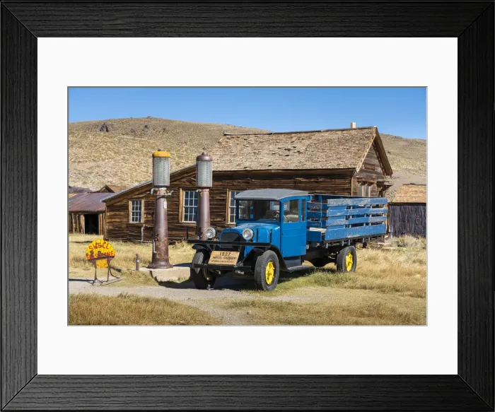 Framed Print : Abandoned blue old pickup truck and wooden deserted buildings in Bodie ghost town Framed Print : Abandoned blue old pickup truck and wooden deserted buildings in Bodie ghost town
