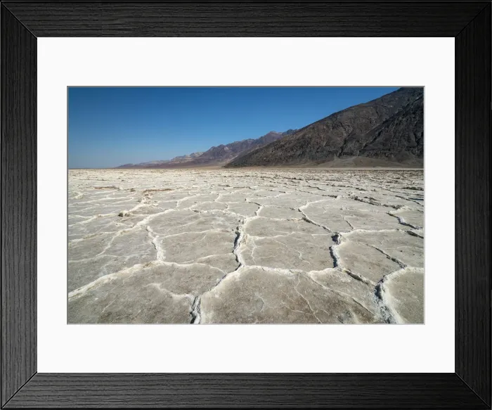 Framed Print : Idyllic view of salt pans by rocky mountains on sunny day, Badwater Basin Framed Print : Idyllic view of salt pans by rocky mountains on sunny day, Badwater Basin