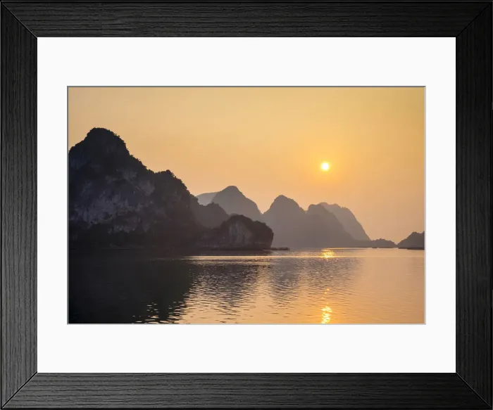 Framed Print : Sunset over karst mountains in Ha Long Bay, Qu£ng Ninh Province, Vietnam Framed Print : Sunset over karst mountains in Ha Long Bay, Qu£ng Ninh Province, Vietnam