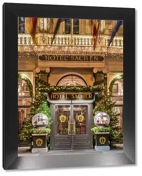 Hotel Sacher entrance decorated with Christmas lights, Vienna, Austria