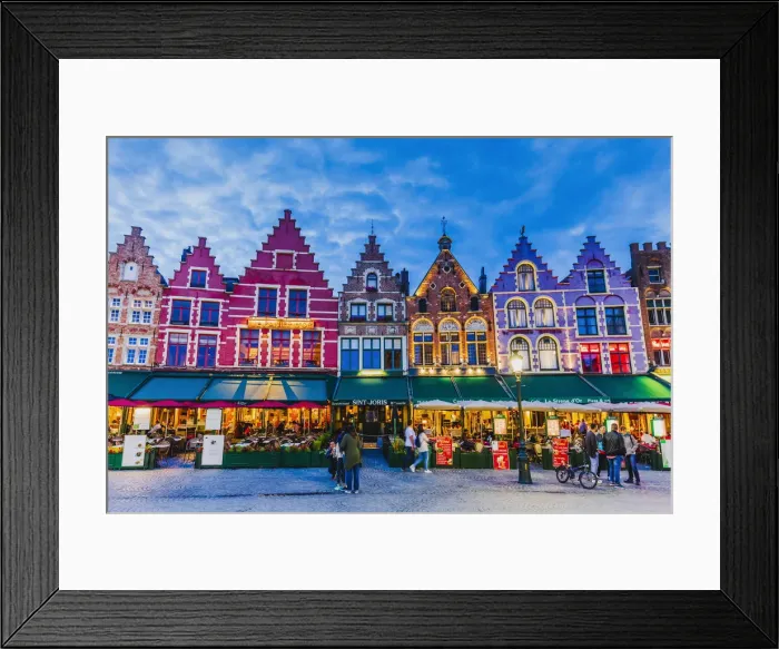 Framed Print : Tourists walking in Market Square in Bruges by night, Belgium Framed Print : Tourists walking in Market Square in Bruges by night, Belgium