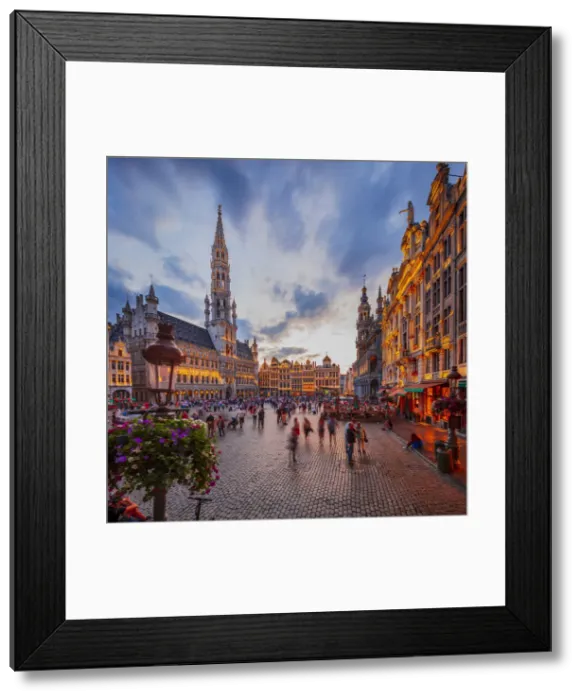 Framed Print : People walking in the Grand Place in Brussels with the Town Hall in the background Framed Print : People walking in the Grand Place in Brussels with the Town Hall in the background