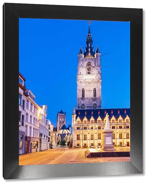 View of Ghent Belfort (beffroi) and Monument Jan Frans Willems by night, Belgium