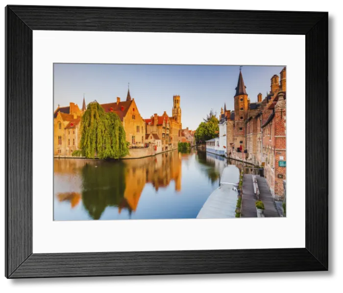 Framed Print : View of Bruges old town reflecting in the water canal at sunrise, Belgium Framed Print : View of Bruges old town reflecting in the water canal at sunrise, Belgium