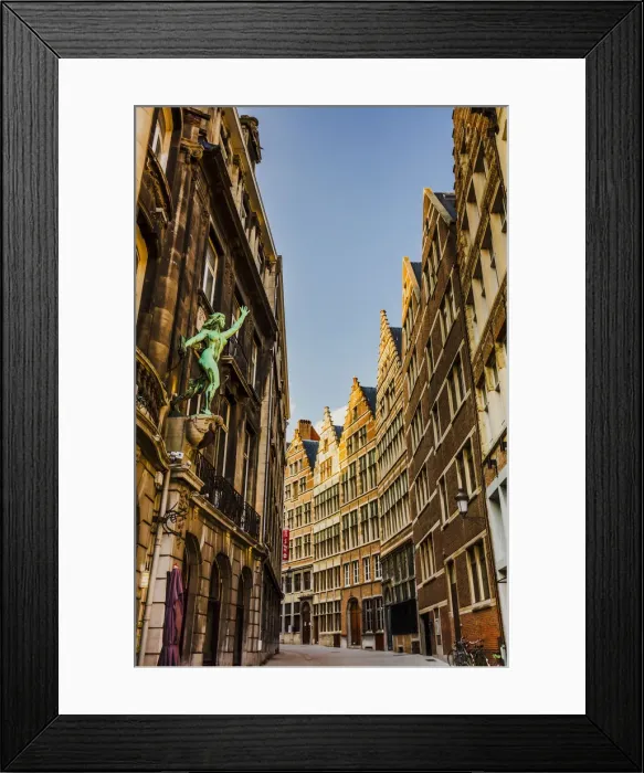 Framed Print : Typical road in Antwerp with old buildings and a statue, Belgium Framed Print : Typical road in Antwerp with old buildings and a statue, Belgium