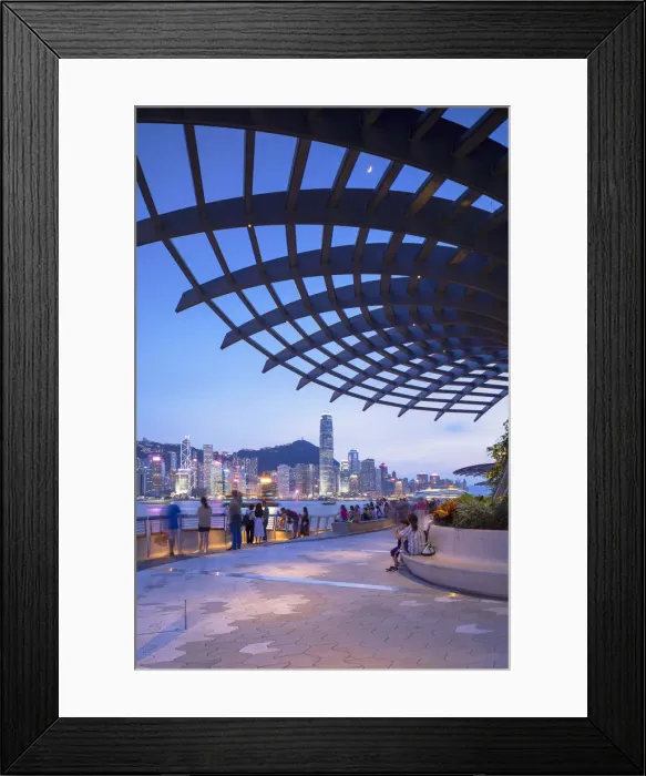 Framed Print : Skyline of Hong Kong Island and Tsim Sha Tsui promenade at sunset, Hong Kong Framed Print : Skyline of Hong Kong Island and Tsim Sha Tsui promenade at sunset, Hong Kong