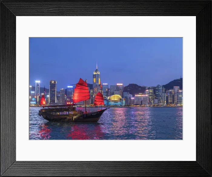 Framed Print : Skyline of Hong Kong Island and junk boat at dusk, Hong Kong Framed Print : Skyline of Hong Kong Island and junk boat at dusk, Hong Kong