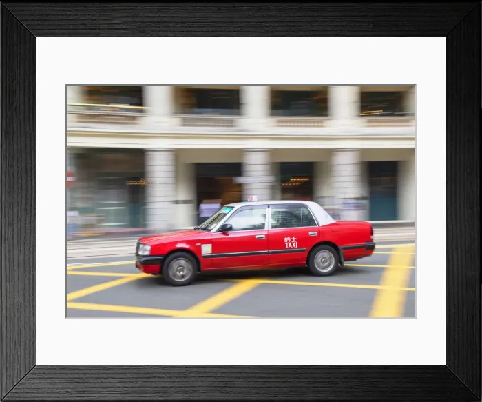 Framed Print : Taxi passing The Pawn, Wan Chai, Hong Kong Framed Print : Taxi passing The Pawn, Wan Chai, Hong Kong