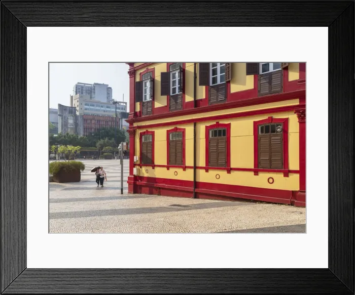 Framed Print : Women walking past Central Library on Tap Seac Square Macau, China Framed Print : Women walking past Central Library on Tap Seac Square Macau, China