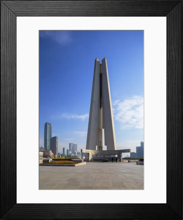 Framed Print : Peoples Heroes Memorial Tower and buildings along Huangpu River, Shanghai, China Framed Print : Peoples Heroes Memorial Tower and buildings along Huangpu River, Shanghai, China