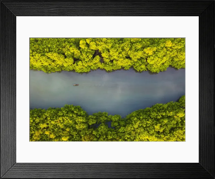 Framed Print : Aerial view of a traditional boat sailing through the bay Framed Print : Aerial view of a traditional boat sailing through the bay