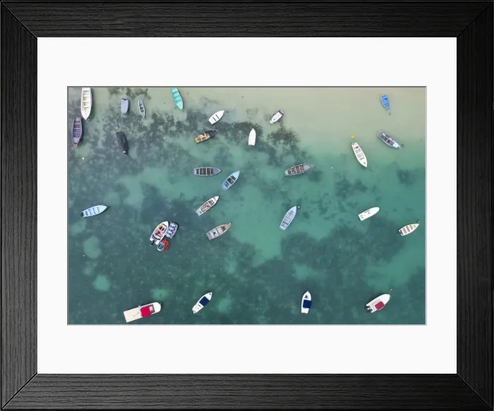 Framed Print : a vertical shot of a boats on the crystalline sea, Black River, Mauritius Framed Print : a vertical shot of a boats on the crystalline sea, Black River, Mauritius