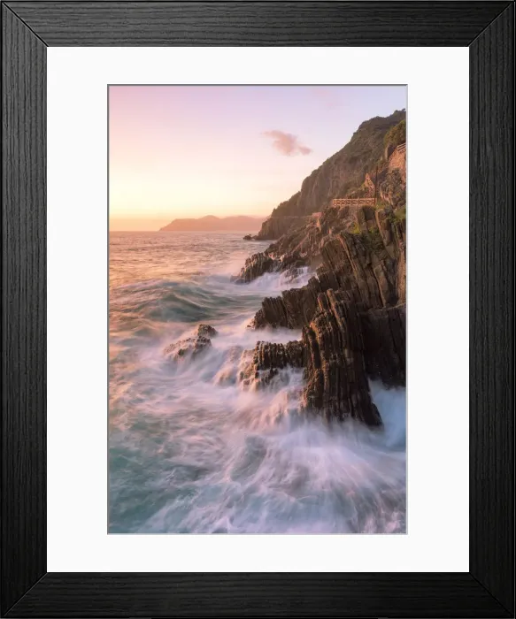 Framed Print : a coloured sunset on cliffs of Riomaggiore, National Park of Cinque Terre, Manarola Framed Print : a coloured sunset on cliffs of Riomaggiore, National Park of Cinque Terre, Manarola