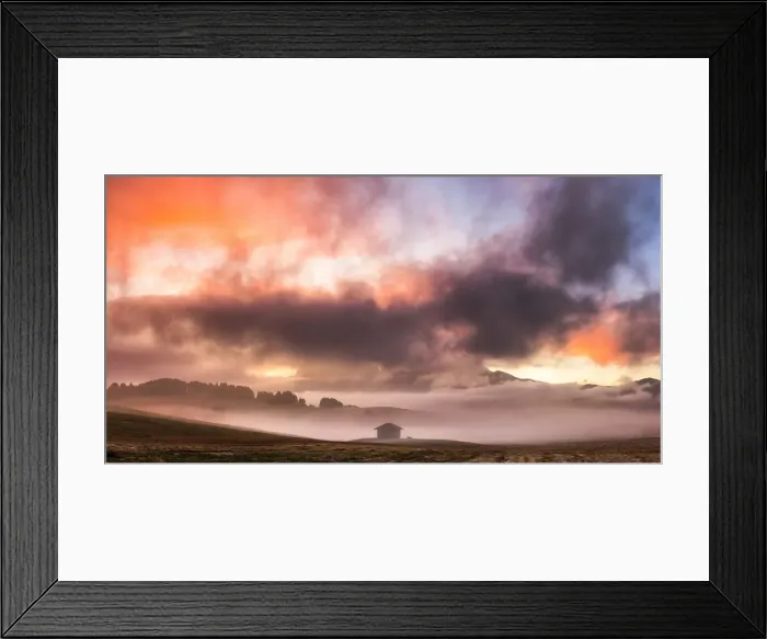 Framed Print : Colors of sunrise illuminates fog with a hut and a cow in silhouette Framed Print : Colors of sunrise illuminates fog with a hut and a cow in silhouette