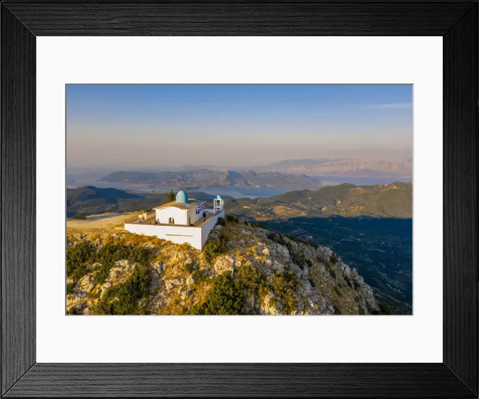 Framed Print : Aerial view of the Orthodox church of the Prophet Elias at sunset in summer Framed Print : Aerial view of the Orthodox church of the Prophet Elias at sunset in summer
