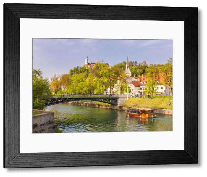 Framed Print : Touristic boat on Ljubljanica river near Hradecky Bridge