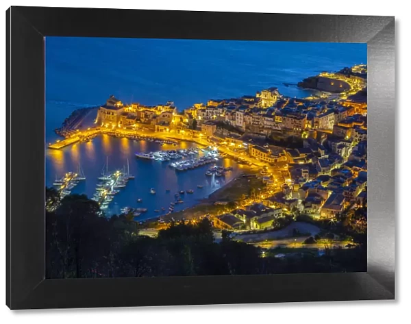 Elevated view of the fishing village Castellammare del Golfo at dusk, Trapani province
