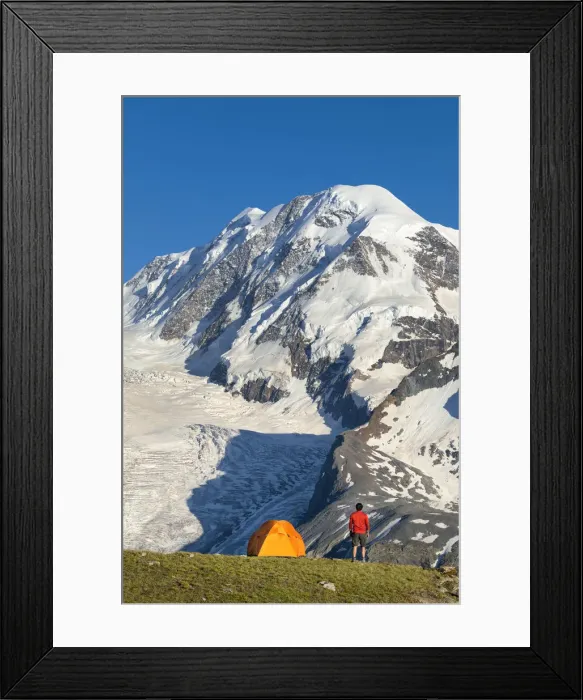 Framed Print : A trekker is looking the Lyskamm, one of the peaks of the Monte Rosa Massif close to Framed Print : A trekker is looking the Lyskamm, one of the peaks of the Monte Rosa Massif close to