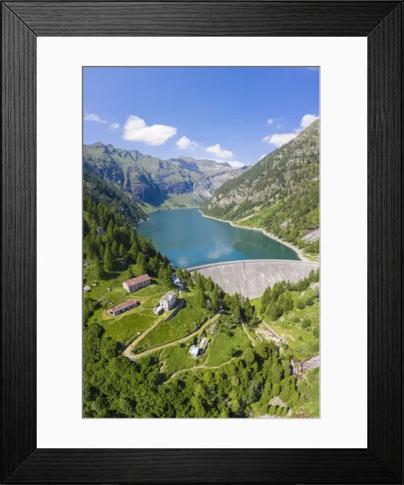 Framed Print : Aerial view of the Agaro Lake and its dam, an artificial lake covering the old town Framed Print : Aerial view of the Agaro Lake and its dam, an artificial lake covering the old town