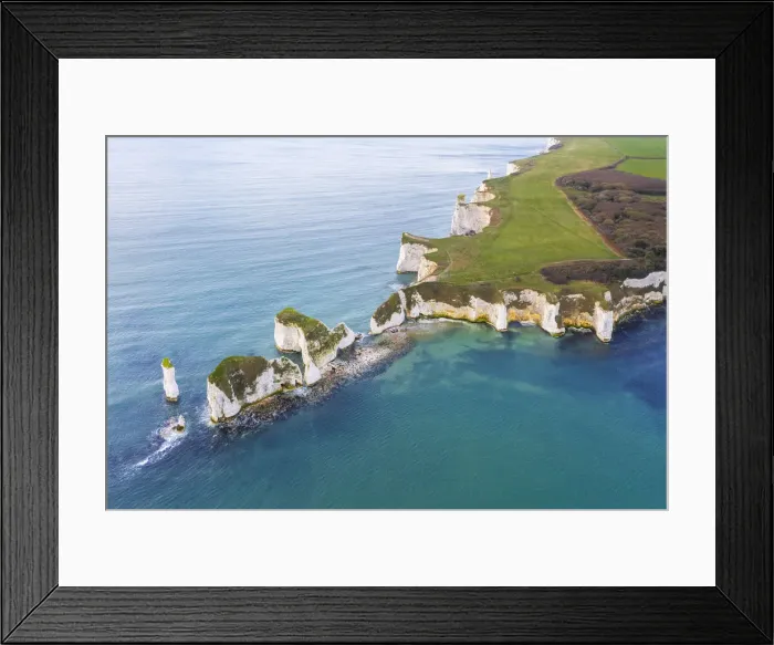 Framed Print : Aerial view at sunrise of the Old Harry Rocks, chalky formations near Handfast Point Framed Print : Aerial view at sunrise of the Old Harry Rocks, chalky formations near Handfast Point
