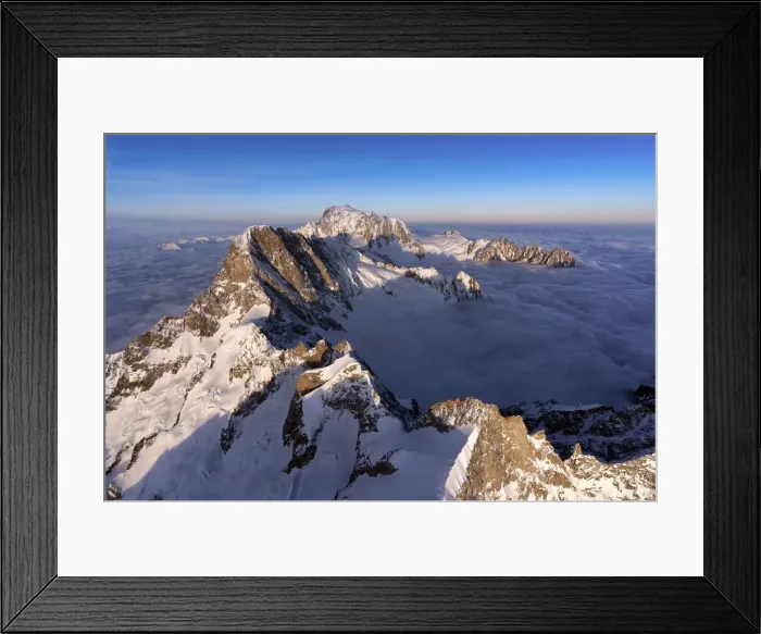 Framed Print : Aerial view of snowy peaks of Mont Blanc during sunrise, Courmayeur, Aosta Valley, Italy