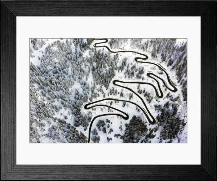 Framed Print : Aerial view of curves of the Maloja pass after a snowfall, Maloja Pass, Bregaglia Valley Framed Print : Aerial view of curves of the Maloja pass after a snowfall, Maloja Pass, Bregaglia Valley
