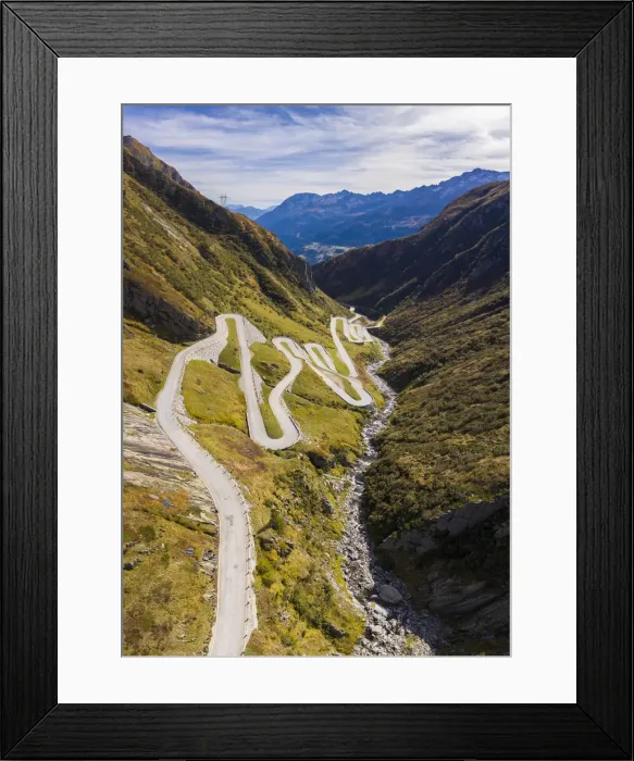 Framed Print : Aerial view of the Tremola San Gottardo road, the longest road monument in Switzerland listed in the inventory of the historic Swiss roads. Passo del San Gottardo, Airolo, Leventina district, Canton Ticino, Switzerland Framed Print : Aerial view of the Tremola San Gottardo road, the longest road monument in Switzerland listed in the inventory of the historic Swiss roads. Passo del San Gottardo, Airolo, Leventina district, Canton Ticino, Switzerland