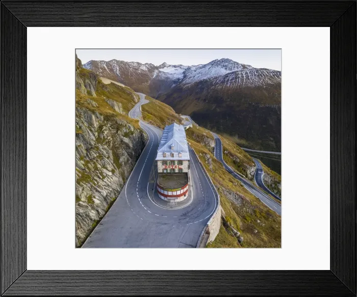 Framed Print : Aerial view of the Belvedere Hotel and the Furka Pass road, famous for a scene of the James Bond film Goldfinger, a high mountain pass in the Swiss Alps connecting Gletsch, Valais with Realp, Uri. Obergoms, Canton of Valais, Swiss Alps, Switzerland