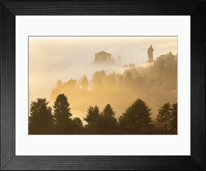 Framed Print : View of the Statue of San Carlo Borromeo in the morning winter fogs Framed Print : View of the Statue of San Carlo Borromeo in the morning winter fogs