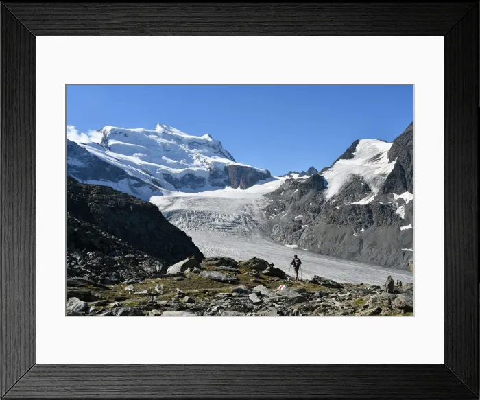 Framed Print : Trekker with Grand Combin on background, Switzerland, Swiss Framed Print : Trekker with Grand Combin on background, Switzerland, Swiss