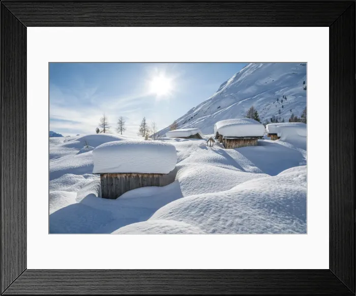 Framed Print : landscape of snow-covered mountain huts in the locality Ciamp de Lobia, Fedaia pass Framed Print : landscape of snow-covered mountain huts in the locality Ciamp de Lobia, Fedaia pass