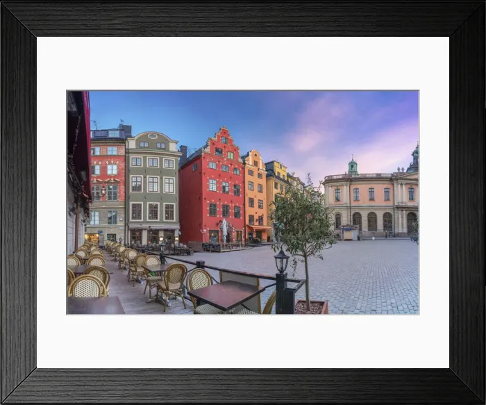 Framed Print : Sunrise over colorful townhouses and restaurants in the medieval Stortorget Square Framed Print : Sunrise over colorful townhouses and restaurants in the medieval Stortorget Square