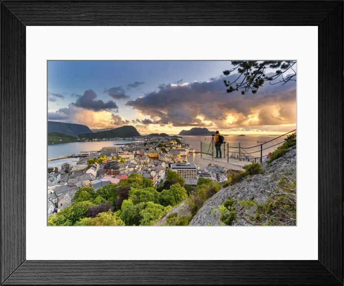Framed Print : Photographer looking at Alesund during sunset from Byrampen viewpoint Framed Print : Photographer looking at Alesund during sunset from Byrampen viewpoint