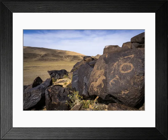 Framed Print : Ancient petroglyphs carving on rocks, Khavstsgait, Gobi Desert, Omnogovi, Mongolia