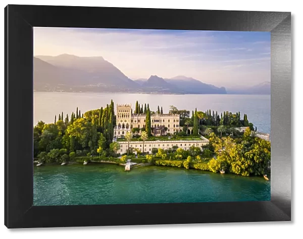 Aerial view of Isola del Garda with Villa Borghese, on the west side of Garda Lake, near Salo town. Garda Lake, Brescia province, Lombardy, Italy