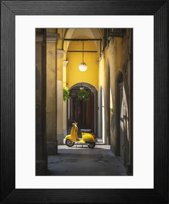 Framed Print : Yellow Vespa in Modena historic city. Modena old town, Emilia Romagna, Italy Framed Print : Yellow Vespa in Modena historic city. Modena old town, Emilia Romagna, Italy