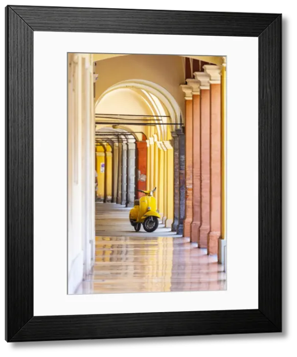 Framed Print : Yellow Vespa in Modena historic city. Modena old town, Emilia Romagna, Italy Framed Print : Yellow Vespa in Modena historic city. Modena old town, Emilia Romagna, Italy