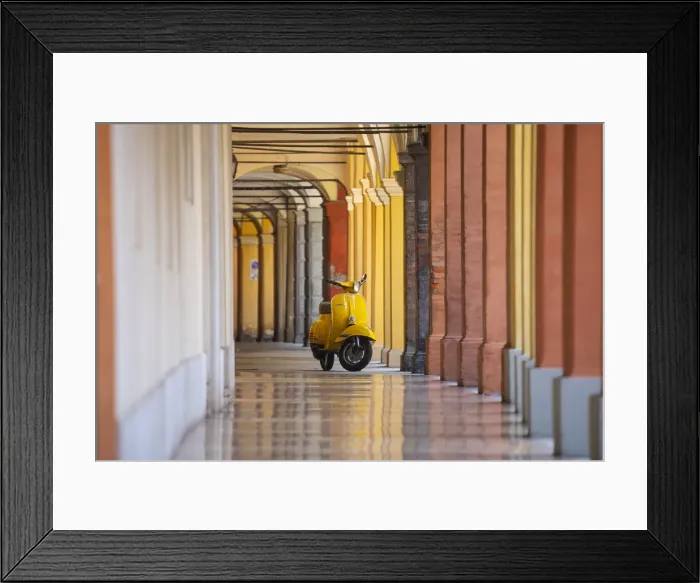 Framed Print : Yellow Vespa in Modena historic city. Modena old town, Emilia Romagna, Italy Framed Print : Yellow Vespa in Modena historic city. Modena old town, Emilia Romagna, Italy