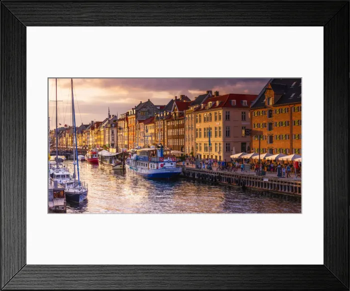 Framed Print : Panoramic view of Nyhavn water canal at sunset in Copenhagen, Denmark Framed Print : Panoramic view of Nyhavn water canal at sunset in Copenhagen, Denmark