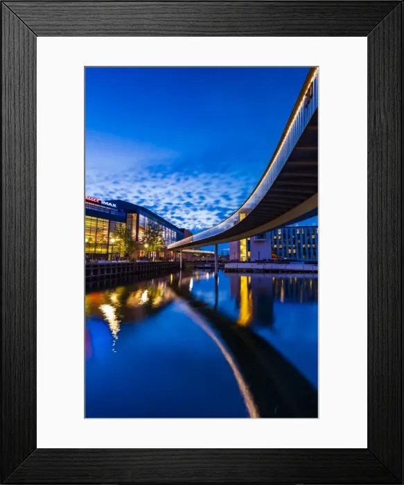 Framed Print : Bridge reflecting in the water canal and Fisketorvet shopping centre in the background by Framed Print : Bridge reflecting in the water canal and Fisketorvet shopping centre in the background by