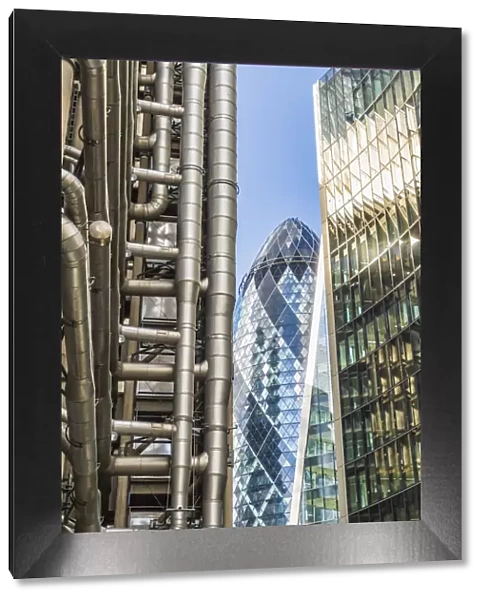 Lloyds of London and The Gherkin also known as the Swiss Re building, London, England, UK