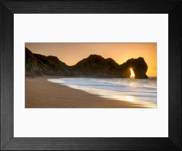 Framed Print : Sunrise Through Durdle Door, Dorset, England Framed Print : Sunrise Through Durdle Door, Dorset, England
