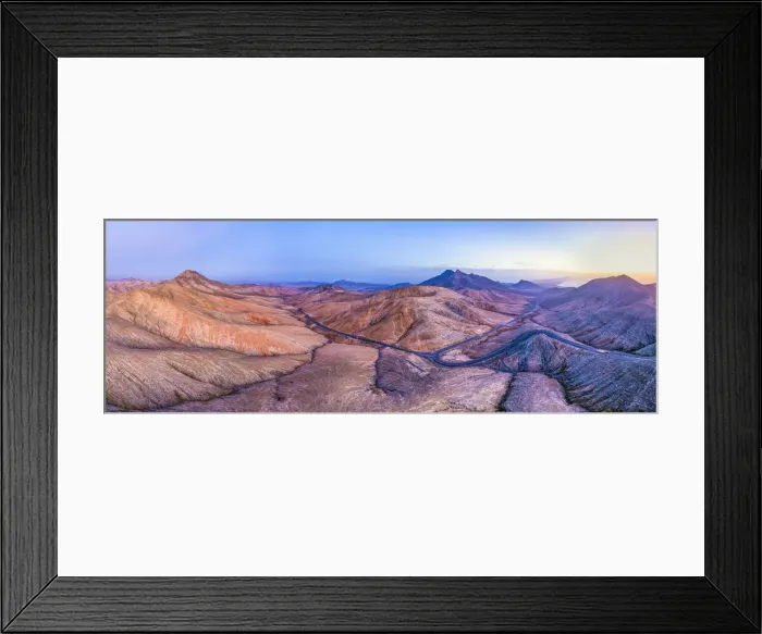 Framed Print : Spain, Canary Islands, Fuerteventura, mountain road crossing the volcanic landscape near Framed Print : Spain, Canary Islands, Fuerteventura, mountain road crossing the volcanic landscape near