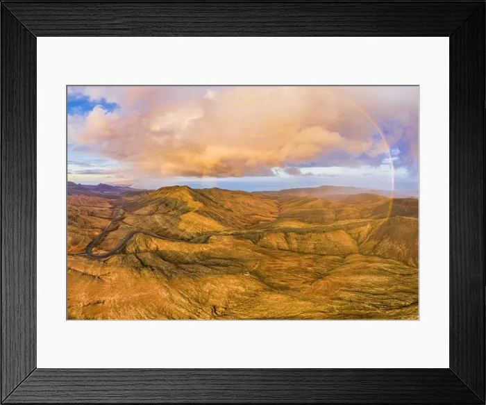 Framed Print : Spain, Canary Islands, Fuerteventura, mountain road crossing the volcanic landscape near Framed Print : Spain, Canary Islands, Fuerteventura, mountain road crossing the volcanic landscape near