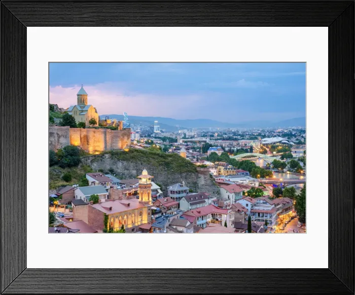 Framed Print : Narikala Fortress and historic buildings in the Abanotubani bath district at dusk