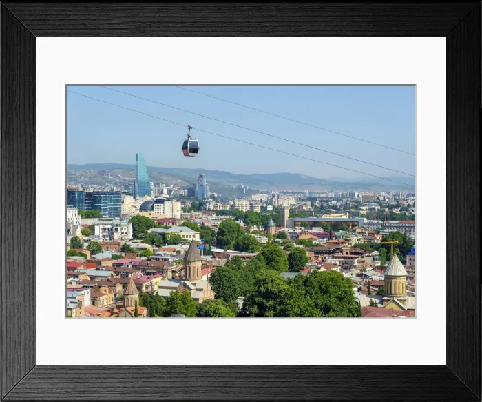 Framed Print : Cable car between Rike Park and the Narikala fortress passes above buildings in central