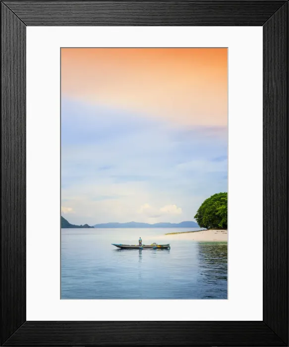 Framed Print : Asia, Indonesia, Spice Islands, Ambon, Malona Island, a local fisherman in front of a Framed Print : Asia, Indonesia, Spice Islands, Ambon, Malona Island, a local fisherman in front of a
